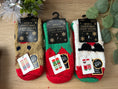 Load image into Gallery viewer, Christmas Cosy Fluffy Socks – Ladies 4–8 & Men 6–11 | Warm Anti-Slip Gripper Socks | 8 Fun Designs (incl. Grinch) Krevana Christmas Cosy Fluffy Socks – Ladies 4–8 & Men 6–11 | Warm Anti-Slip Gripper Socks | 8 Fun Designs (incl. Grinch)