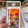 Load image into Gallery viewer, Personalised Christmas gift set with Wildflower art bookmark, white rose gold pen and three chocolates in a gift box
