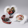 Load image into Gallery viewer, Personalised photo feather ornament on the table