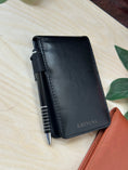 Load image into Gallery viewer, Personalised PU Leather A7 Notepad Holder – Custom Laser Engraved Pocket Notebook with Pen, Durable & Elegant Gift (Brown or Black) Krevana Personalised PU Leather A7 Notepad Holder – Custom Laser Engraved Pocket Notebook with Pen, Durable & Elegant Gift (Brown or Black)
